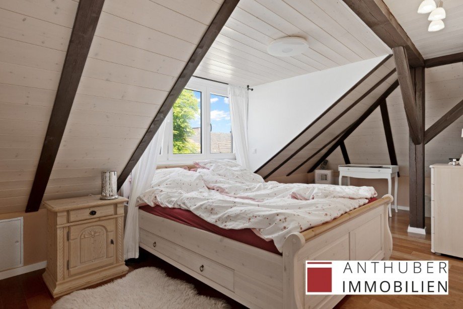Schlafzimmer im Dachgeschoss Einfamilienhaus Mickhausen