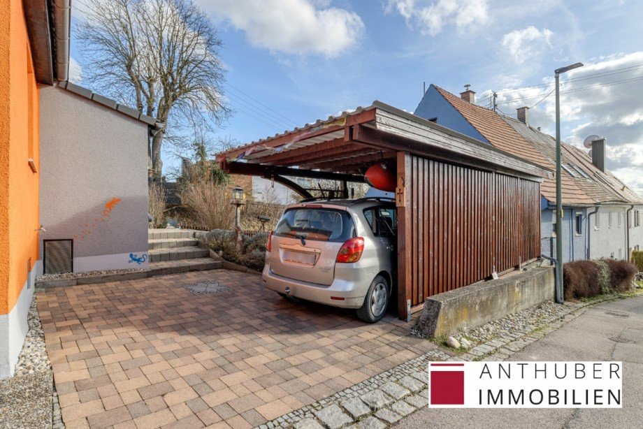 Carport und freundlicher Empfang durch die Geckos Einfamilienhaus Neus��